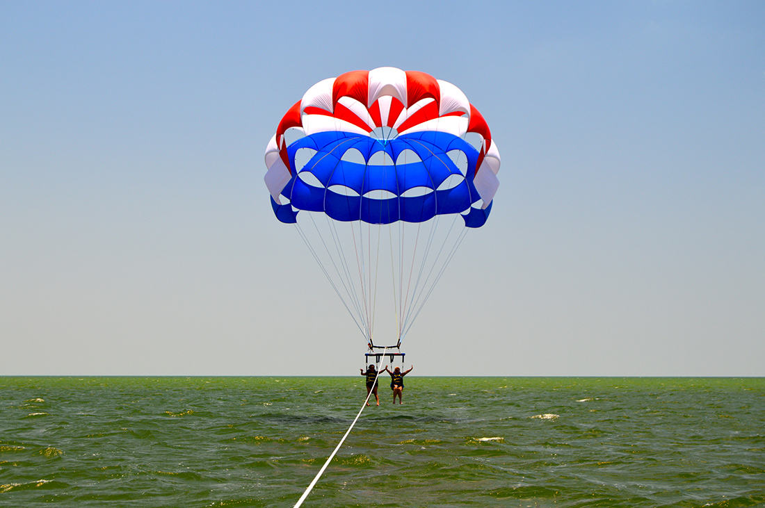 fun parasailing on fort myers beach-fort myers beach life